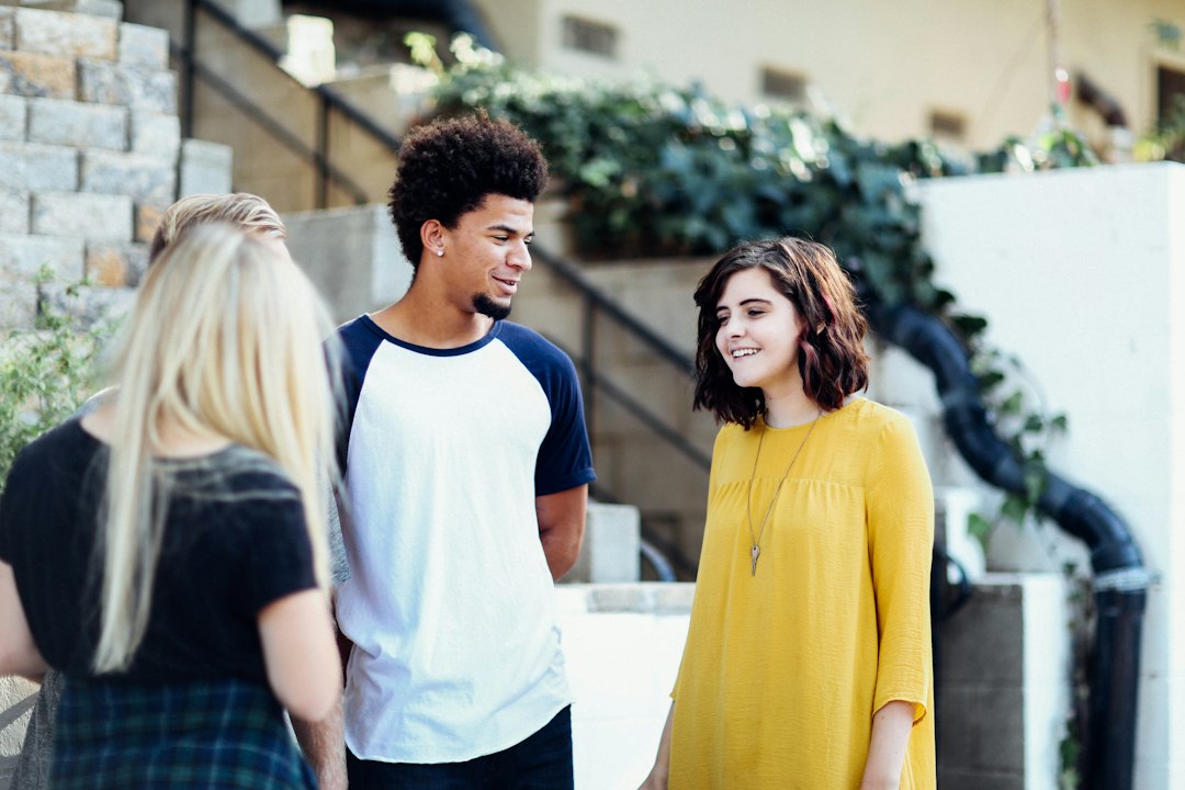 Young adults from different backgrounds in conversation