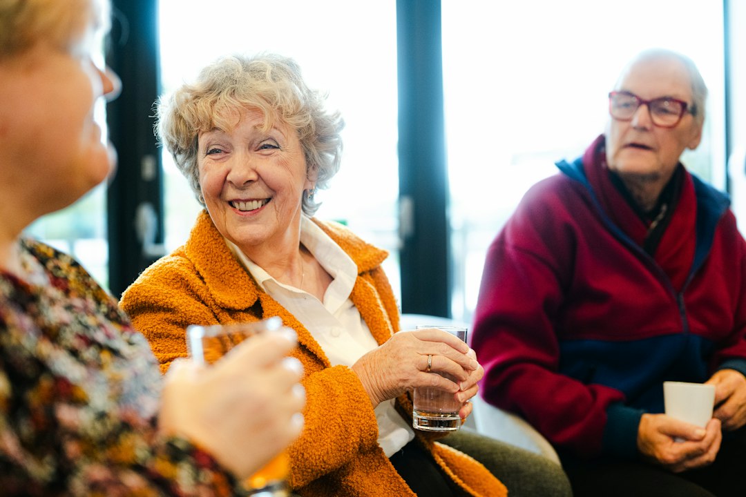 Older adults talking and smiling together